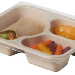 Compostable food tray with Caesar Wrap carrots peaches, sealed