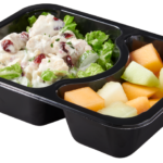 Plastic food tray with Chicken Salad Melon