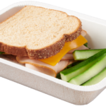 Paperboard food tray with Turkey Sandwich Cucumbers