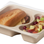 Compostable food tray with Roast Beef Sandwich Apple Salad sealed