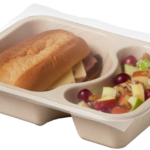 Compostable food tray with Roast Beef Sandwich Apple Salad sealed