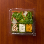 1 Compartment Plastic Cold Tray with Insert containing Salad, Turkey, Ranch & Cheese with film lid top