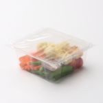 1 Compartment Plastic Cold Tray with Insert containing Veggies & 3 Hummus choices with film lid ¾ view